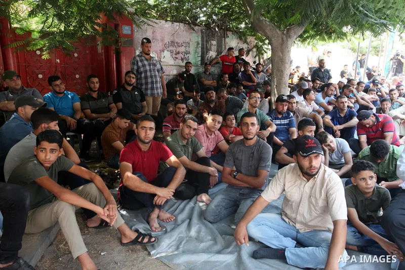 Palestinians attend Friday prayer in solidarity with pisoners in Israeli jails, in front of Red Cross office in Gaza city on September 02, 2022. The Palestinian Authority's committee for current and former detainees said...