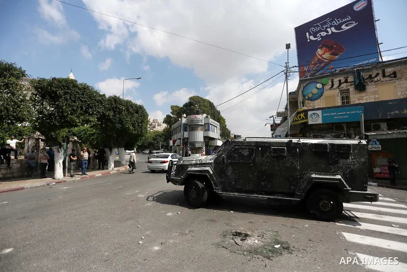 Palestinian protesters clash with Palestinian security forces in Nablus in the West Bank on September 20, 2022. Photo by Shadi Jarar'ah\ apaimages