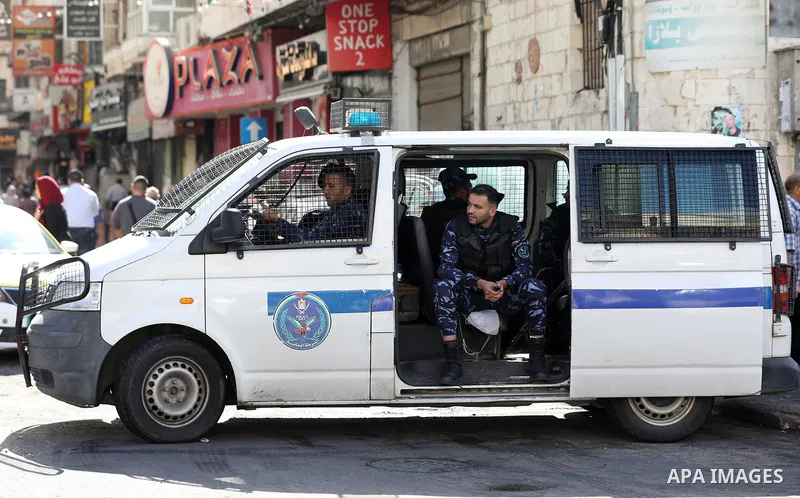Palestinian men clean as calm returns to the West Bank city of Nablus following clashes between protesters and Palestinian security forces the previous day, on September 21, 2022. Photo by Stringer\ apaimages