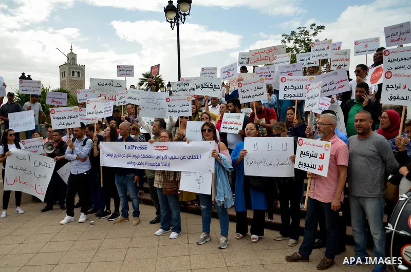 October 13, 2022, Tunis, Tunisia: Tunis, Tunisia. 13 October 2022. Tunisian journalists and human rights activists hold a protest in support of press freedom at the Kasba Square in Tunis. Protesters carried banners and c...