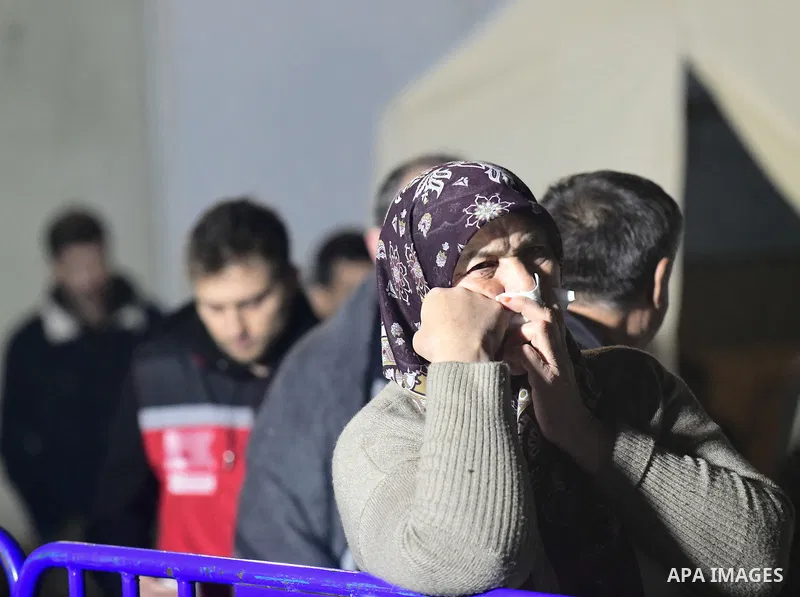Relatives and friends of mine workers wait outside a coal mine after an explosion in Amasra, in Bartin Province, Turkey, on October 15, 2022. Rescuers desperately searched for signs of life on October 15, 2022 after a me...