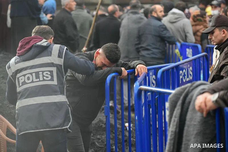 Relatives and friends of mine workers wait outside a coal mine after an explosion in Amasra, in Bartin Province, Turkey, on October 15, 2022. Rescuers desperately searched for signs of life on October 15, 2022 after a me...