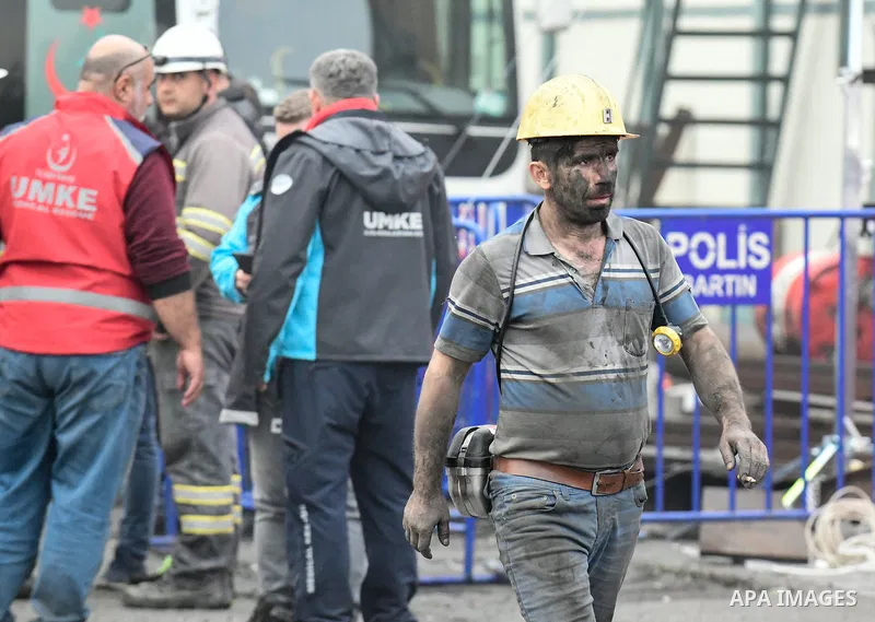 Relatives and friends of mine workers wait outside a coal mine after an explosion in Amasra, in Bartin Province, Turkey, on October 15, 2022. Rescuers desperately searched for signs of life on October 15, 2022 after a me...