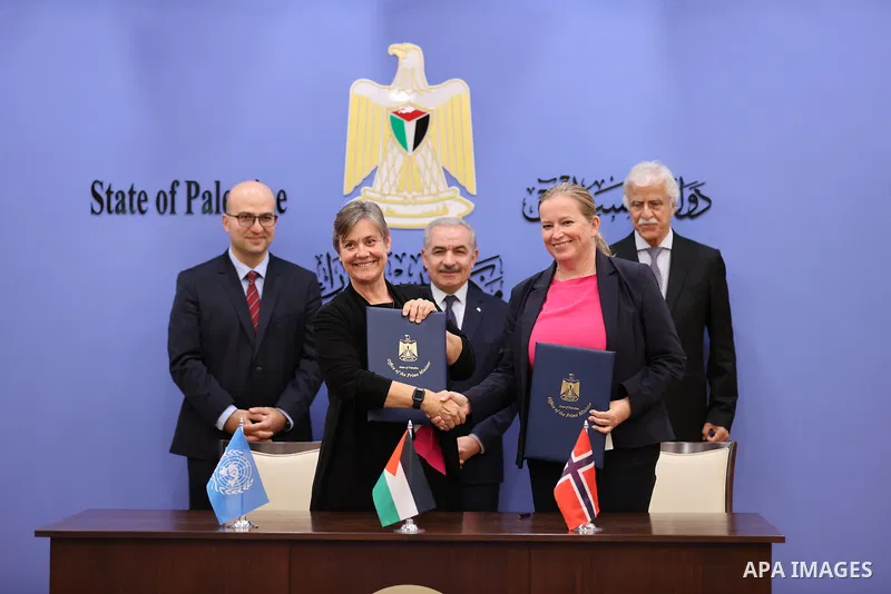 Palestinain Prime Minister Mohammad Shtayyeh attends a signing ceremony to support education in Jerusalem worth $6.3 million between the representative of Norway to Palestine and the representative of the United Nations...