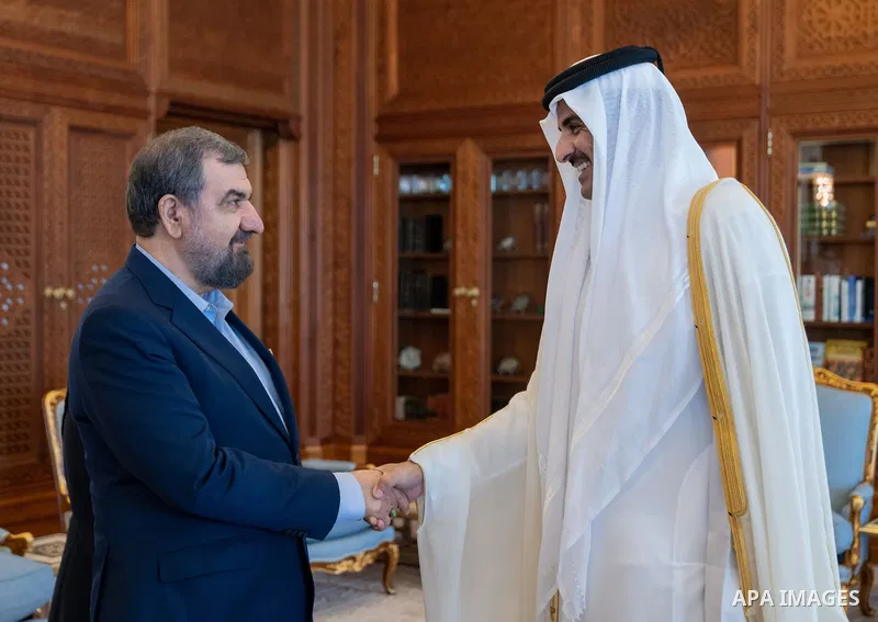 Emir of Qatar Tamim bin Hamad Al Thani meets with Mohsen Rezaei, Assistant to the President of the Islamic Republic of Iran for Economic Affairs, in Doha, Qatar on October 17, 2022. Photo by Emiri Diwan Office/APAimages