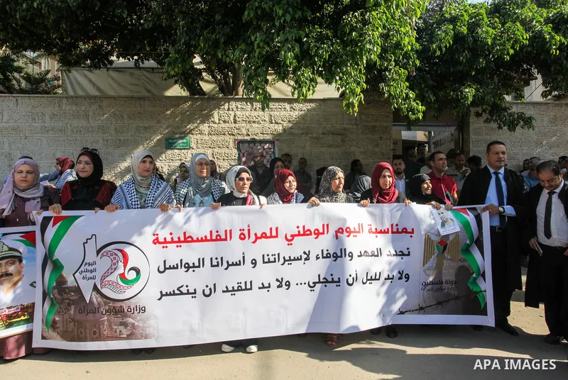 Palestinians take part in a protest in solidarity with prisoners in Israeli jails, in front of Red Cross office in Gaza city on October 24, 2022. The Israeli District Court in Lydda rejected an appeal for the early relea...