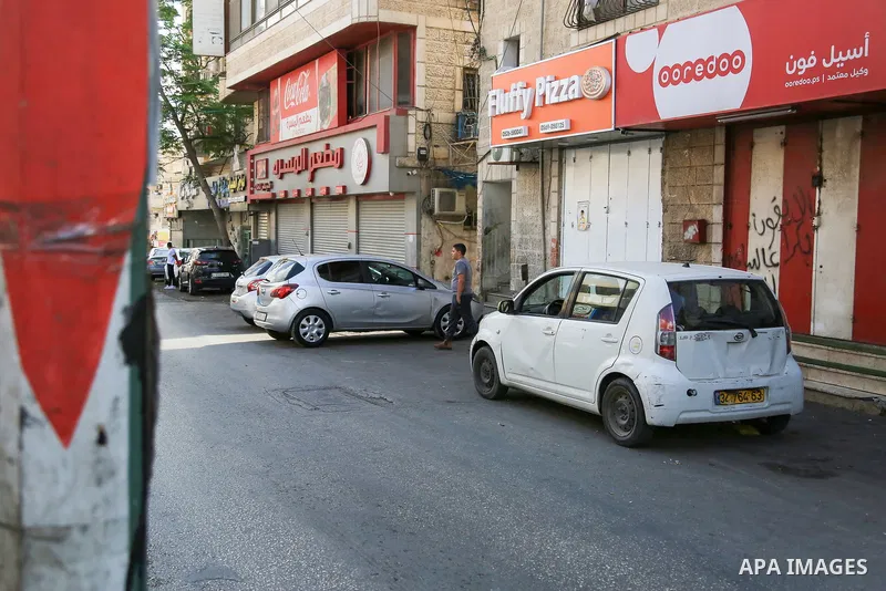 Shuttered shops are seen in the town of al-Eizariya, east of the city of Jerusalem during a general strike, in mourning of a Palestinian resident killed by Israeli forces yesterday in Jericho on October 31, 2022. All sho...