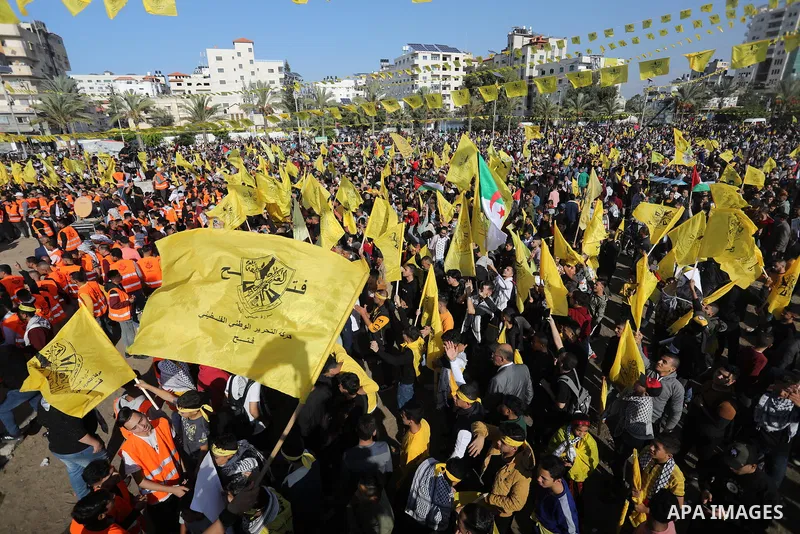 Palestinian supporters of Fatah movement attends the festival marking the 18th anniversary of the death of the late Palestinian President Yasser Arafat, in Gaza city on November 10, 2022. Arafat, also known as Abu Ammar...
