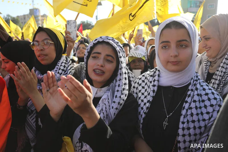 Palestinian supporters of Fatah movement attends the festival marking the 18th anniversary of the death of the late Palestinian President Yasser Arafat, in Gaza city on November 10, 2022. Arafat, also known as Abu Ammar...