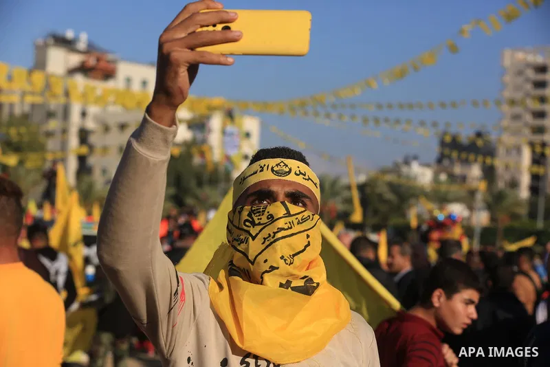 Palestinian supporters of Fatah movement attends the festival marking the 18th anniversary of the death of the late Palestinian President Yasser Arafat, in Gaza city on November 10, 2022. Arafat, also known as Abu Ammar...