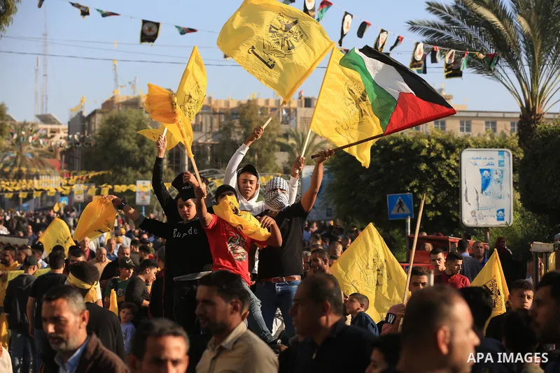 Palestinian supporters of Fatah movement attends the festival marking the 18th anniversary of the death of the late Palestinian President Yasser Arafat, in Gaza city on November 10, 2022. Arafat, also known as Abu Ammar...