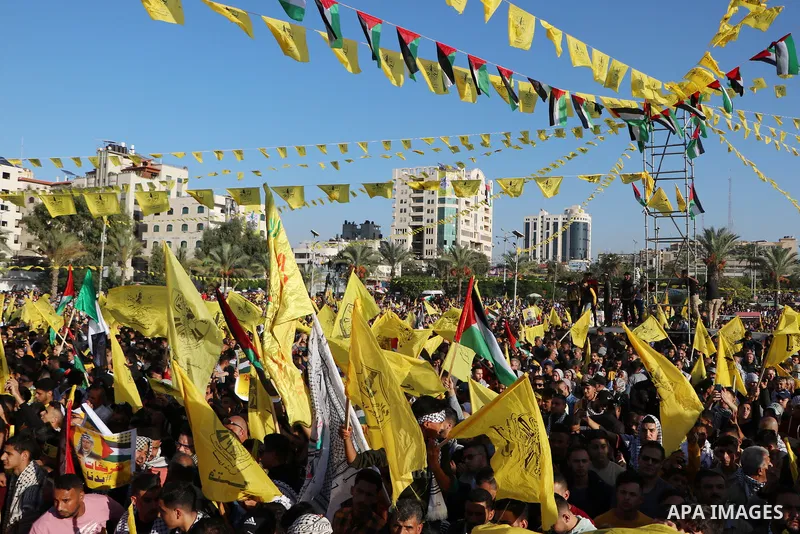 Palestinian supporters of Fatah movement attends the festival marking the 18th anniversary of the death of the late Palestinian President Yasser Arafat, in Gaza city on November 10, 2022. Arafat, also known as Abu Ammar...