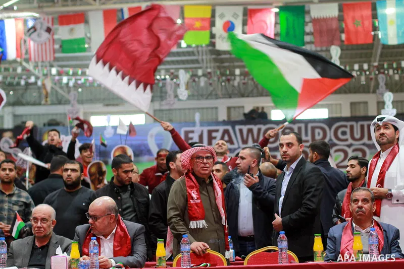 Qatari Ambassador to Palestine, Mohammed al-Emadi attend the FIFA World Cup 2022 match between Qatar and Senegal alongside with Palestinian fans, in Gaza city on November 25, 2022. Senegal record Africa’s first win at th...