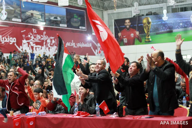 Palestinians gather as they watch the football match between Tunisia V France in FIFA World cup, in Gaza city on November 30, 2022. Photo by Ali Hamad\ apaimages