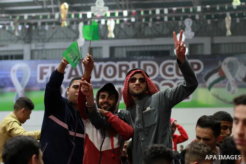 Palestinians gather as they watch the football match between Saudi Arabia V Mexico in FIFA World cup, in Gaza city on November 30, 2022. Photo by Ali Hamad\ apaimages