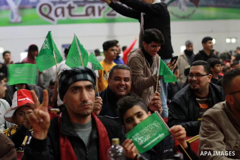 Palestinians gather as they watch the football match between Saudi Arabia V Mexico in FIFA World cup, in Gaza city on November 30, 2022. Photo by Ali Hamad\ apaimages