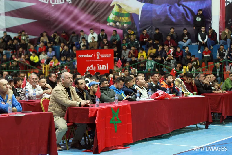 Palestinian fans attend the match between Morocco VS Canada, in the Qatar World Cup FIFA 2022, via a huge screen at a public place in Gaza city on December 1, 2022. The 2022 FIFA World Cup is an association football tour...