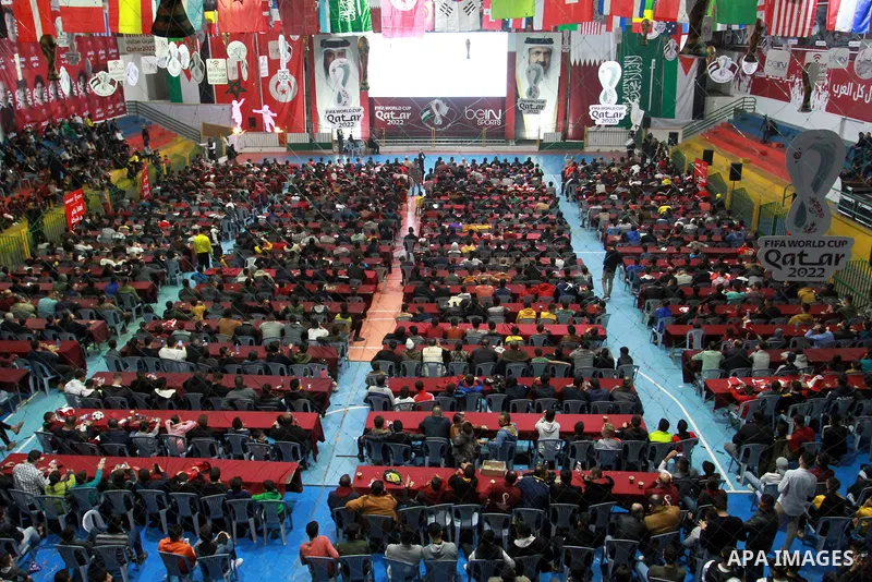 Palestinian fans attend the match between Morocco VS Canada, in the Qatar World Cup FIFA 2022, via a huge screen at a public place in Gaza city on December 1, 2022. The 2022 FIFA World Cup is an association football tour...