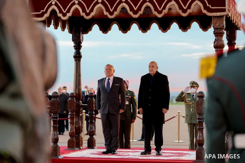 Jordanian King Abdullah II is being welcomed by Algerian President Abdelmadjid Tebboune at the Houari Boumediene Airport in Algiers, Algeria on December 03, 2022. Photo by Royal Hashemite Court