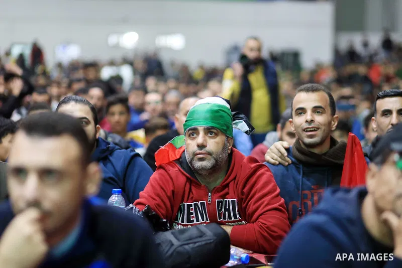 Palestinian fans celebrate after Morocco's victory over Spain in the World Cup in Qatar 2022, in Gaza city on December 6, 2022. Photo by Ali Hamad\ apaimages
