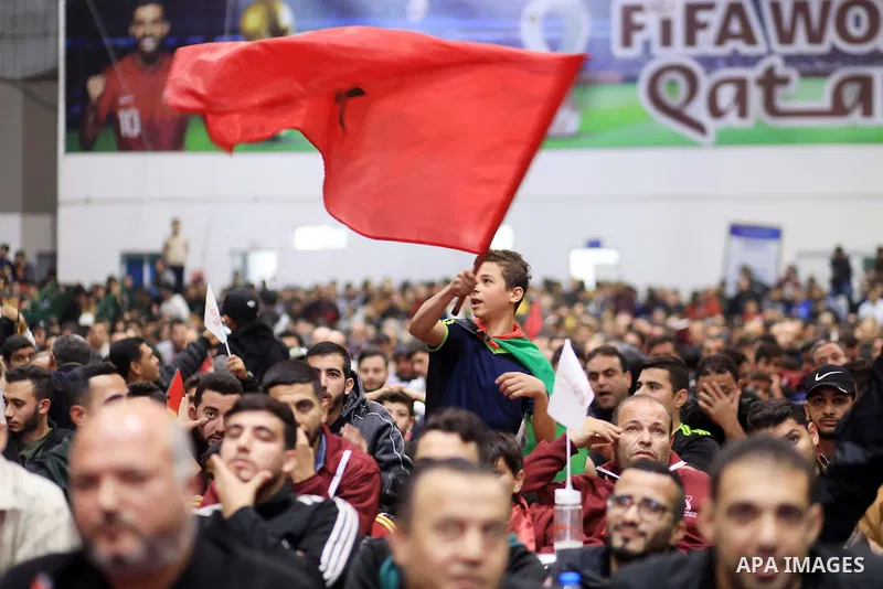 Palestinian fans celebrate after Morocco's victory over Spain in the World Cup in Qatar 2022, in Gaza city on December 6, 2022. Photo by Ali Hamad\ apaimages