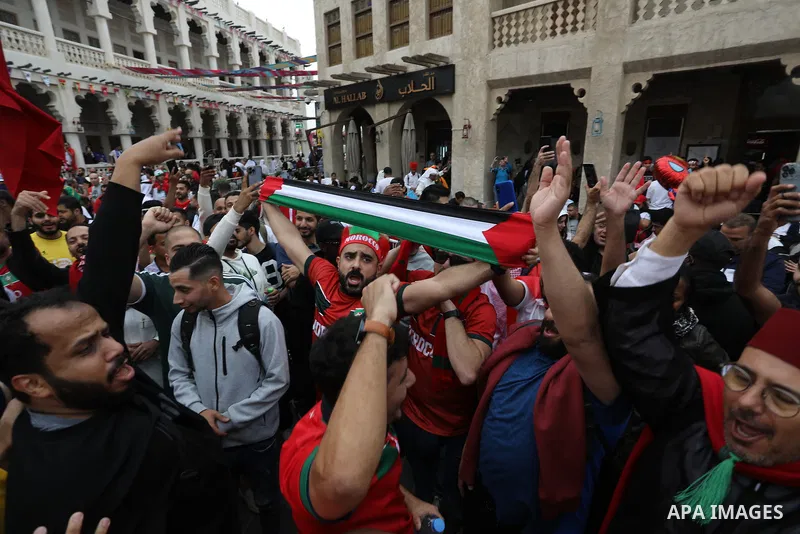 Fans gather in the streets of Doha ahead of the match Morocco vs Portugal in FIFA World Cup, in Doha, Qatar on December 10, 2022. The 2022 FIFA World Cup is an association football tournament, contested by the men's nati...