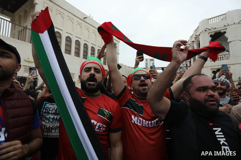 Fans gather in the streets of Doha ahead of the match Morocco vs Portugal in FIFA World Cup, in Doha, Qatar on December 10, 2022. The 2022 FIFA World Cup is an association football tournament, contested by the men's nati...