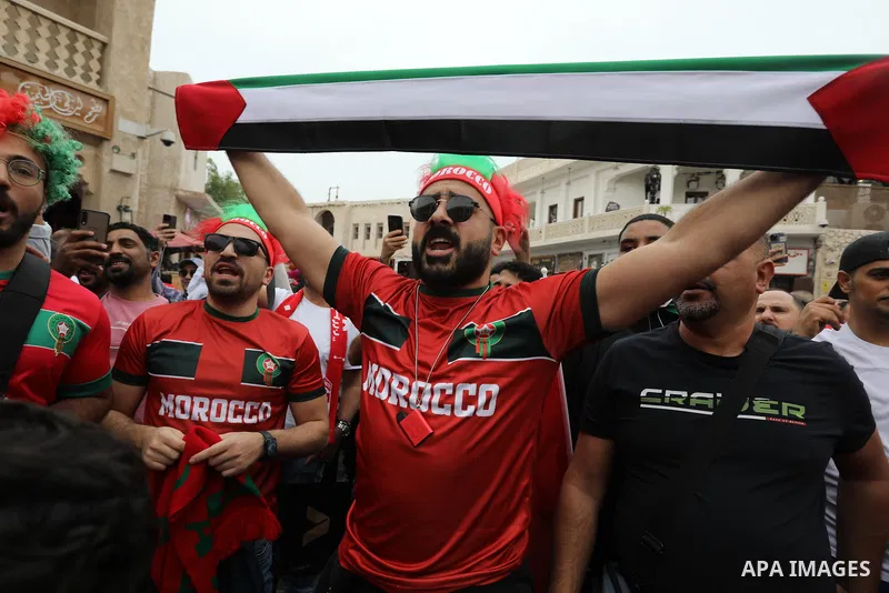 Fans gather in the streets of Doha ahead of the match Morocco vs Portugal in FIFA World Cup, in Doha, Qatar on December 10, 2022. The 2022 FIFA World Cup is an association football tournament, contested by the men's nati...