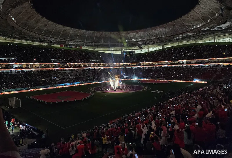 Fans cheer in the stadium during Morocco vs Portugal match in FIFA World Cup, in Doha, Qatar on December 10, 2022. The 2022 FIFA World Cup is an association football tournament, contested by the men's national teams of F...