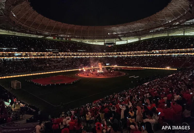 Fans cheer in the stadium during Morocco vs Portugal match in FIFA World Cup, in Doha, Qatar on December 10, 2022. The 2022 FIFA World Cup is an association football tournament, contested by the men's national teams of F...