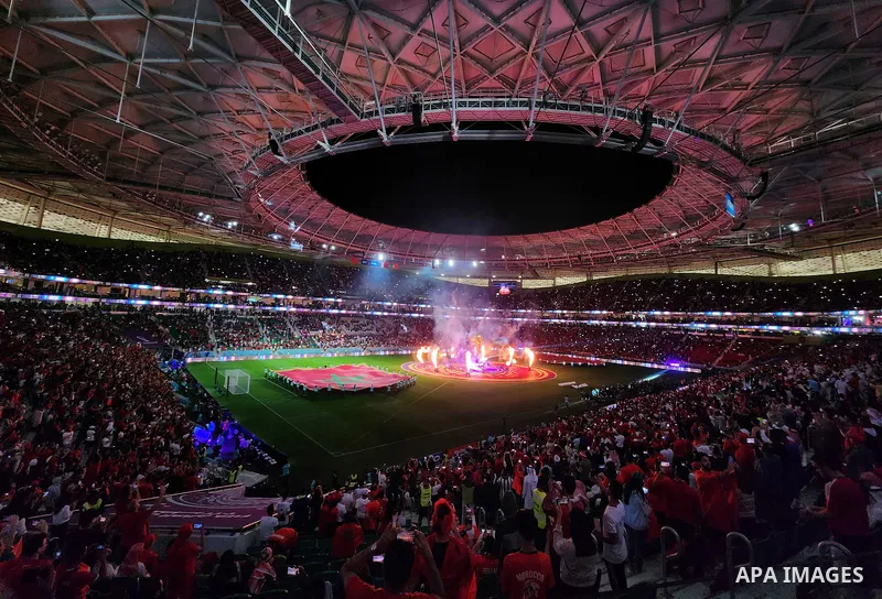 Fans cheer in the stadium during Morocco vs Portugal match in FIFA World Cup, in Doha, Qatar on December 10, 2022. The 2022 FIFA World Cup is an association football tournament, contested by the men's national teams of F...