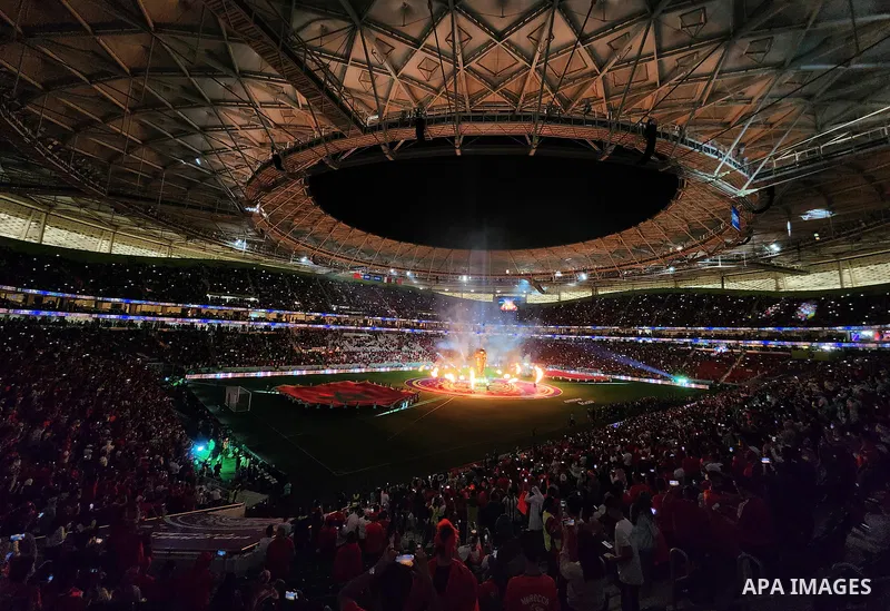 Fans cheer in the stadium during Morocco vs Portugal match in FIFA World Cup, in Doha, Qatar on December 10, 2022. The 2022 FIFA World Cup is an association football tournament, contested by the men's national teams of F...
