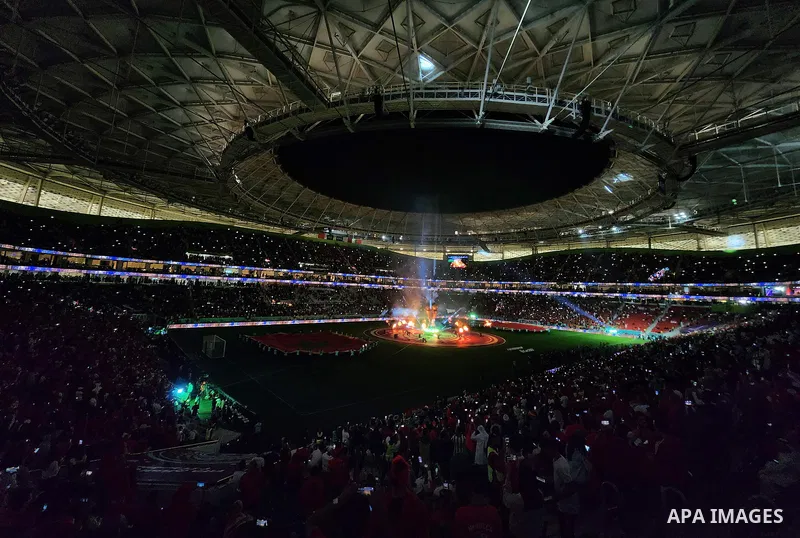 Fans cheer in the stadium during Morocco vs Portugal match in FIFA World Cup, in Doha, Qatar on December 10, 2022. The 2022 FIFA World Cup is an association football tournament, contested by the men's national teams of F...