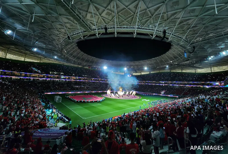 Fans cheer in the stadium during Morocco vs Portugal match in FIFA World Cup, in Doha, Qatar on December 10, 2022. The 2022 FIFA World Cup is an association football tournament, contested by the men's national teams of F...