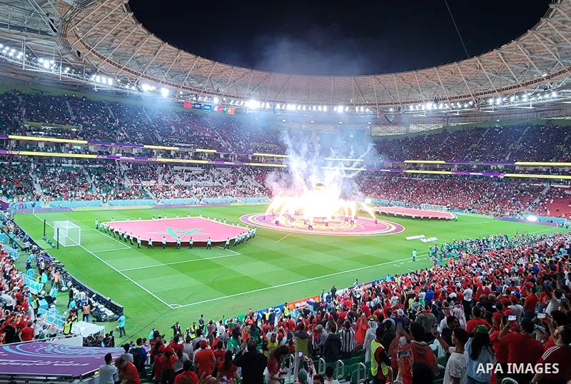 Fans cheer in the stadium during Morocco vs Portugal match in FIFA World Cup, in Doha, Qatar on December 10, 2022. The 2022 FIFA World Cup is an association football tournament, contested by the men's national teams of F...