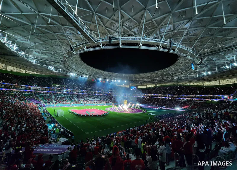 Fans cheer in the stadium during Morocco vs Portugal match in FIFA World Cup, in Doha, Qatar on December 10, 2022. The 2022 FIFA World Cup is an association football tournament, contested by the men's national teams of F...