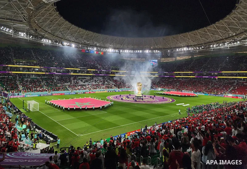 Fans cheer in the stadium during Morocco vs Portugal match in FIFA World Cup, in Doha, Qatar on December 10, 2022. The 2022 FIFA World Cup is an association football tournament, contested by the men's national teams of F...