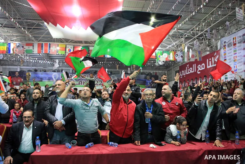 Palestinian fans gather to attend Morocco vs Portugal match in Gaza city on 10, 2022. The 2022 . Photo by Ali Hamad