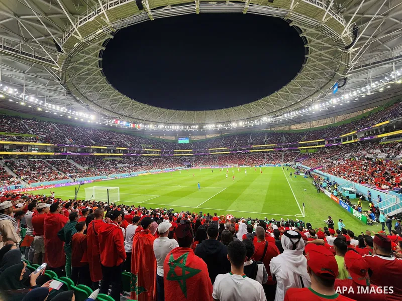 Fans cheer in the stadium during Morocco vs Portugal match in FIFA World Cup, in Doha, Qatar on December 10, 2022. The 2022 FIFA World Cup is an association football tournament, contested by the men's national teams of F...