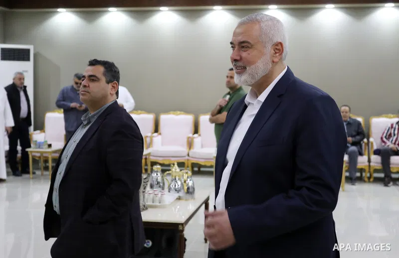 Head of the Political Bureau of Hamas, Ismail Haniyeh, visits the Palestinian sports and media delegation to the World Cup, in Doha, Qatar on December 13, 2022. The 2022 FIFA World Cup is an association football tourname...