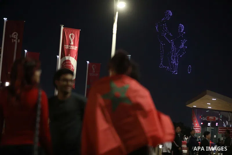 Fans attend on a huge screen the semi-final match between Morocco and France on the Doha Corniche on December 14, 2022. The 2022 FIFA World Cup is an association football tournament, contested by the men's national teams...