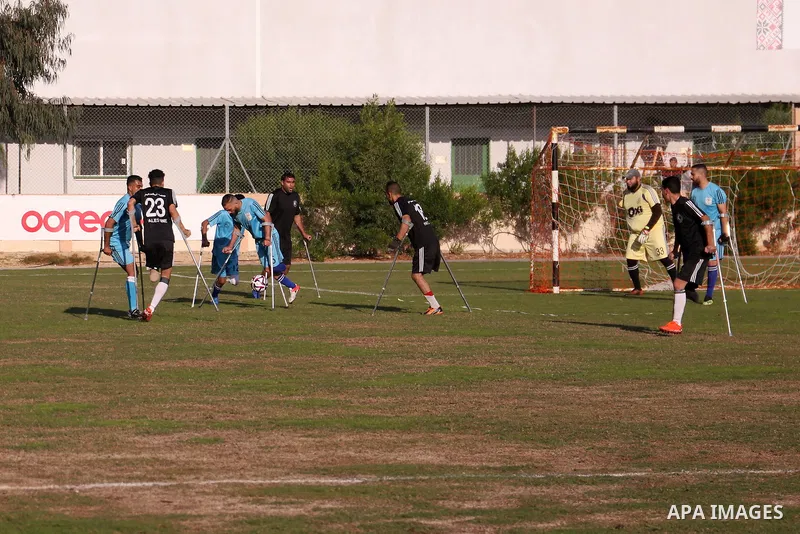 Palestinian players compete during the final of a local football championship for amputees organised by the International Committee of the Red Cross (ICRC), in Gaza City on December 20, 2022. According to The Internation...