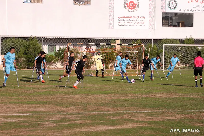 Palestinian players compete during the final of a local football championship for amputees organised by the International Committee of the Red Cross (ICRC), in Gaza City on December 20, 2022. According to The Internation...