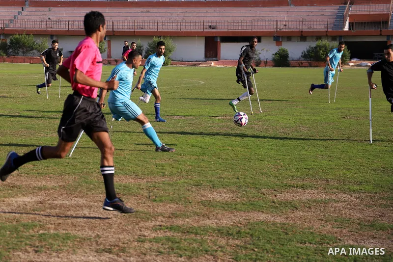 Palestinian players compete during the final of a local football championship for amputees organised by the International Committee of the Red Cross (ICRC), in Gaza City on December 20, 2022. According to The Internation...