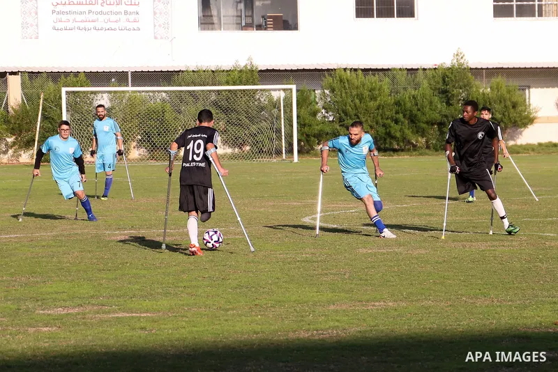 Palestinian players compete during the final of a local football championship for amputees organised by the International Committee of the Red Cross (ICRC), in Gaza City on December 20, 2022. According to The Internation...