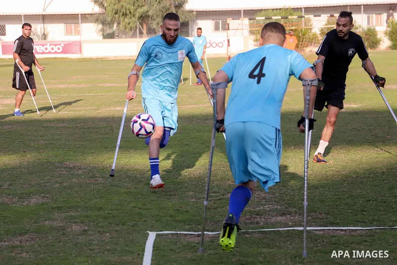 Palestinian players compete during the final of a local football championship for amputees organised by the International Committee of the Red Cross (ICRC), in Gaza City on December 20, 2022. According to The Internation...