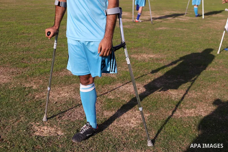 Palestinian players compete during the final of a local football championship for amputees organised by the International Committee of the Red Cross (ICRC), in Gaza City on December 20, 2022. According to The Internation...