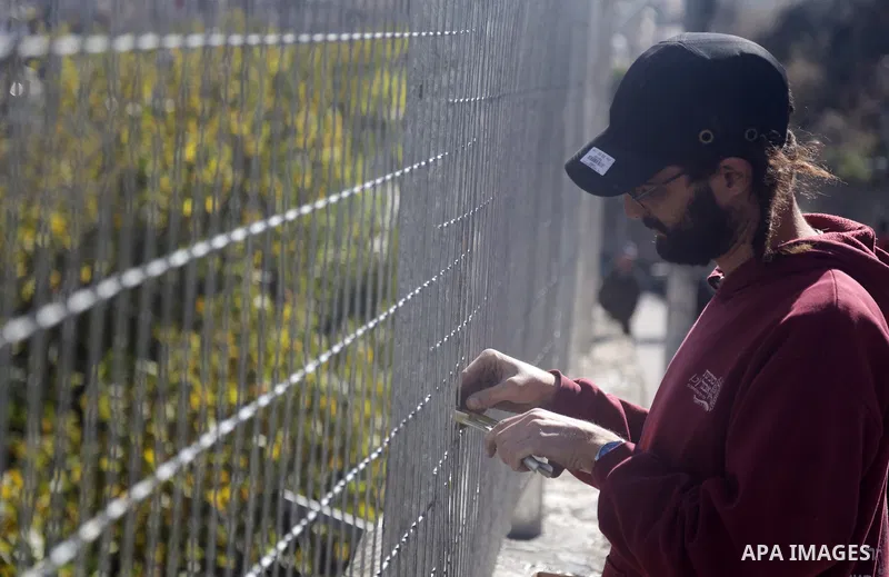 Israeli settlers protected by police broke seized a 5-dunum plot of land is owned by the Greek Orthodox Church but that the Sumrin family into Silwan neighborhood in East Jerusalem on December 27, 2022. Settlers have bee...