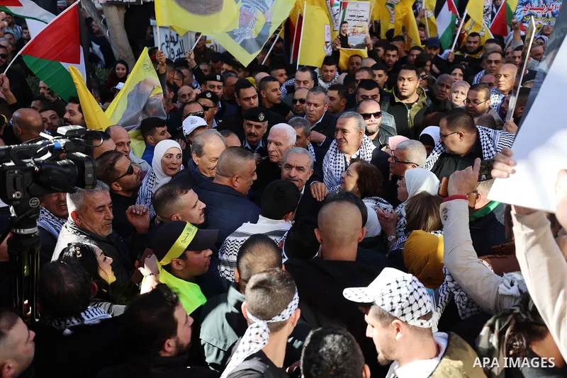 Palestinian Prime Minister Mohammad Shtayyeh attend a rally marking the 58th anniversary of the foundation of Palestinian Fatah movement in the West Bank city of Ramallah, on December 29, 2022. Photo by Shadi Hatem\ apai...