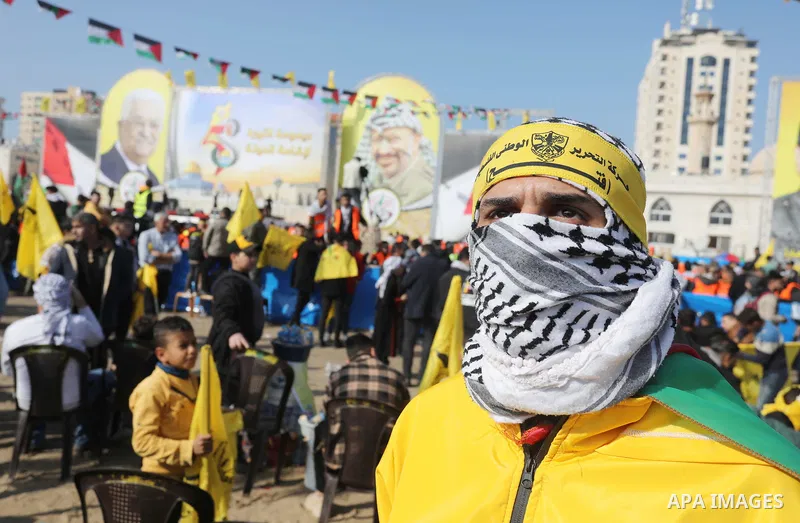 Palestinian supporters of the Fatah movement take part during a rally marking the 58th anniversary of the creation of the political party, in Gaza city, on December 31, 2022. Photo by Ashraf Amra\ apaimages